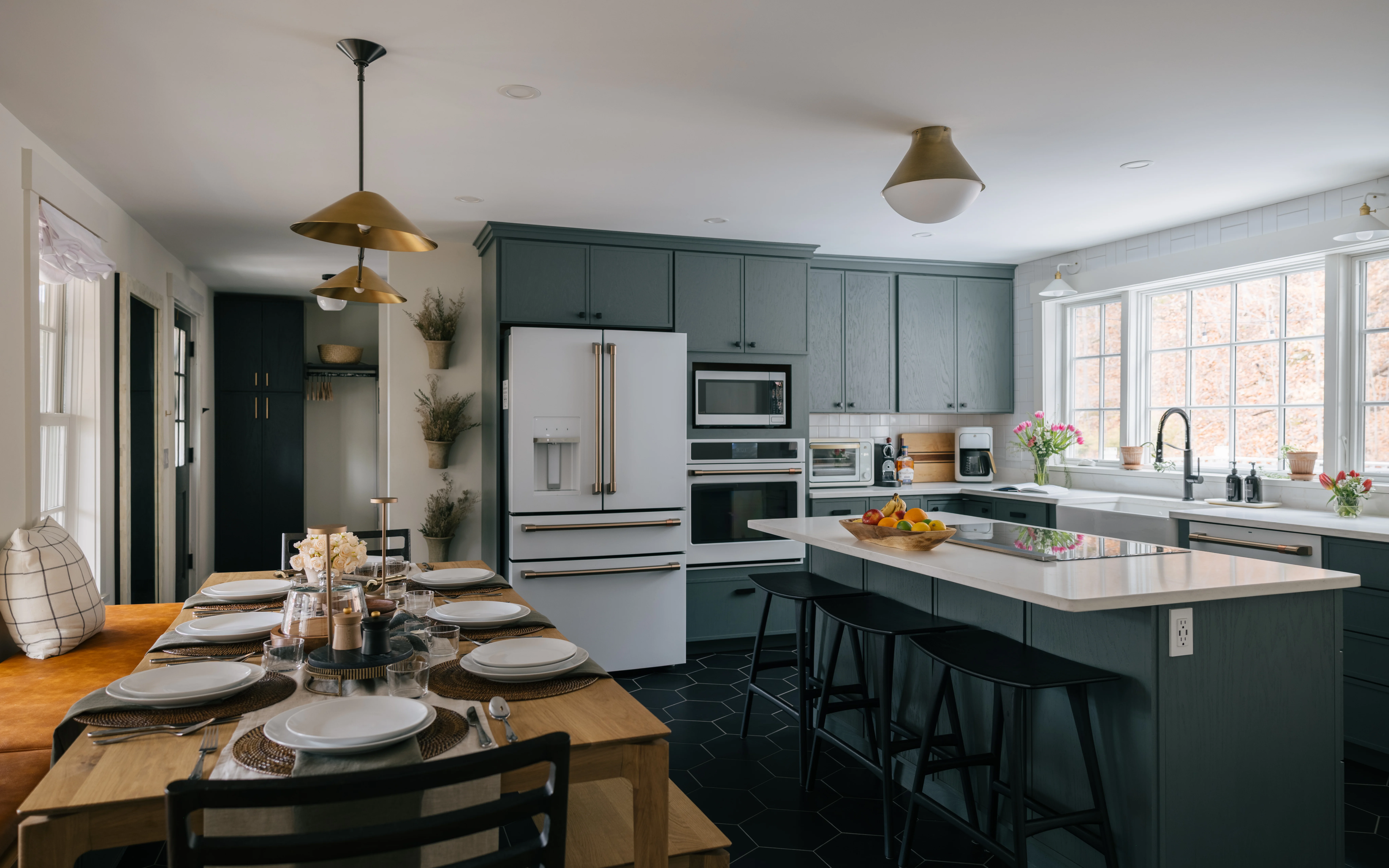 Refreshed kitchen with green cabinetry and updated 2026 finishes at Mile Away Stowe